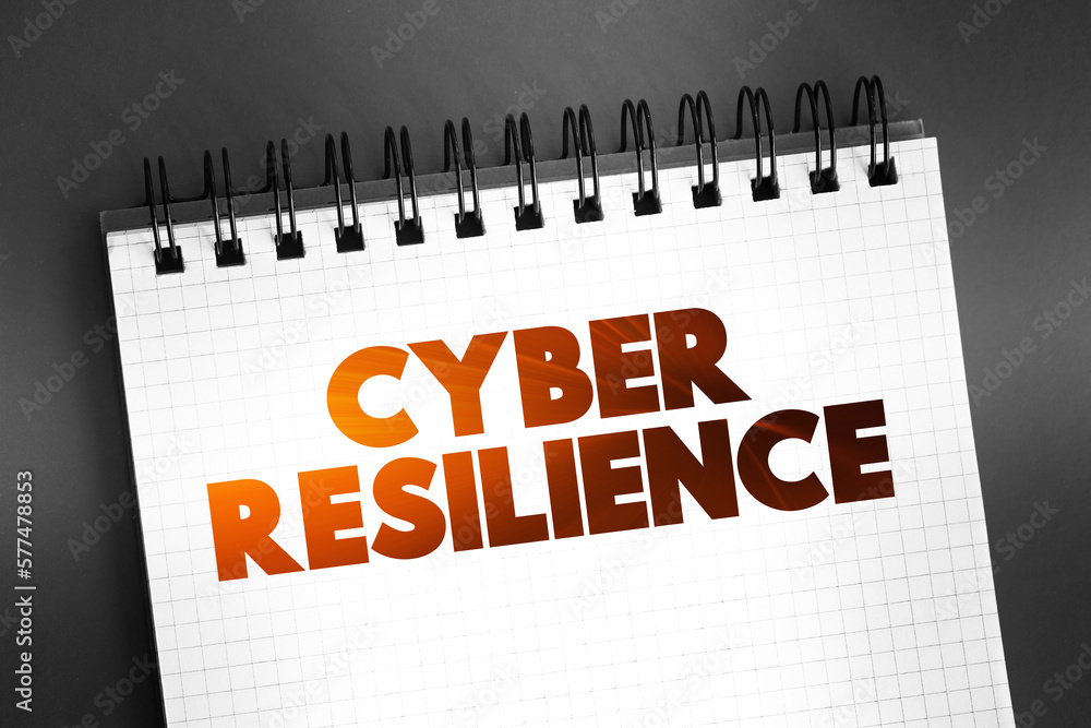 Poster cyber resilience text on notepad, concept background