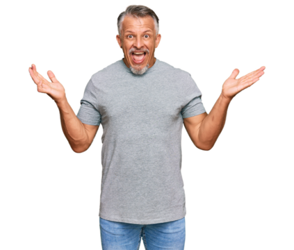 Middle age grey-haired man wearing casual clothes celebrating victory with happy smile and winner expression with raised hands - Powered by Adobe