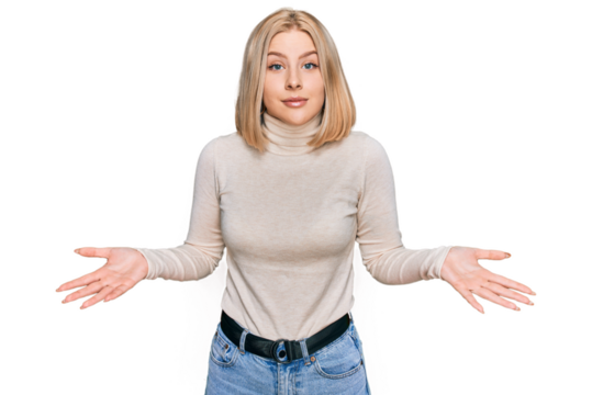 Young blonde woman wearing casual clothes clueless and confused expression with arms and hands raised. doubt concept.