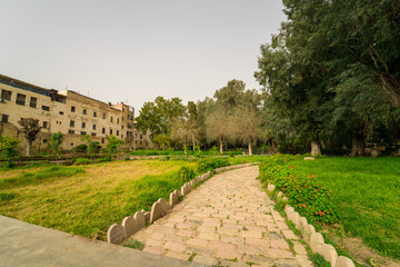 Cobblestone footpath at Jnan Sbil Gardens in the old town of Fez, Morocco