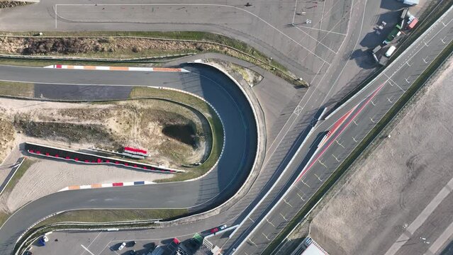 Experience the twists and turns of Circuit Zandvoort in all its glory with this mesmerizing top-down view.