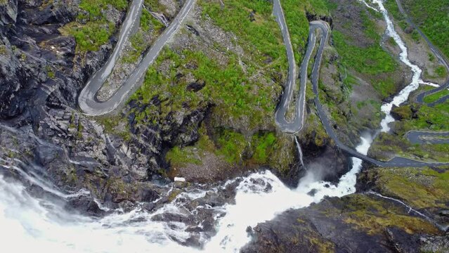 Aerial view of a winding road and valley on the famous Trollstigen mountain pass road in Norway	
