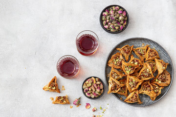Traditional Arabic dessert Baklava with nuts and sweet syrup.	