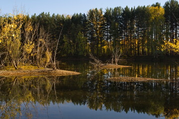 Russia. South of Western Siberia, Kuzbass. A windless sunny evening at the Pritomsky quarries of Novokuznetsk in the middle of autumn.