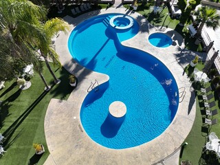 Pool and lounge chairs in the pool area