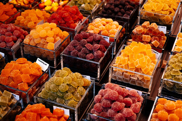 A group of colourful fruit marmalade selling at the Spanish open market.