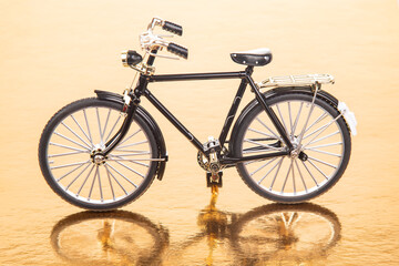 Obraz na płótnie Canvas road bike model on a yellow background. transport for travel