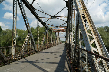 Old metal bridge across Dniester river in the city of Halych, western Ukraine