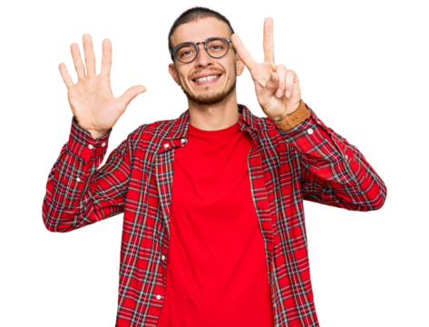 Hispanic young man wearing casual clothes showing and pointing up with fingers number seven while smiling confident and happy.
