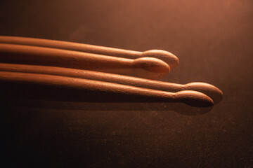 Double exposure shot of drumsticks