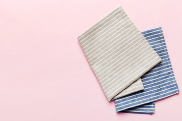 top view with gray kitchen napkin isolated on table background. Folded cloth for mockup with copy space, Flat lay. Minimal style
