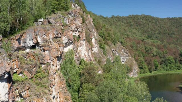 Southern Urals, rocks by the mountain river Zilim near the Kinderlin cave. Aerial view.