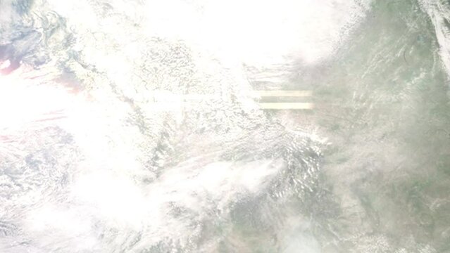 Earth zoom in from outer space to city. Zooming on Sandpoint, Idaho, USA. The animation continues by zoom out through clouds and atmosphere into space. Images from NASA