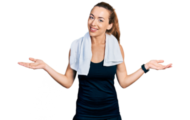 Young caucasian woman wearing sportswear and towel smiling showing both hands open palms, presenting and advertising comparison and balance