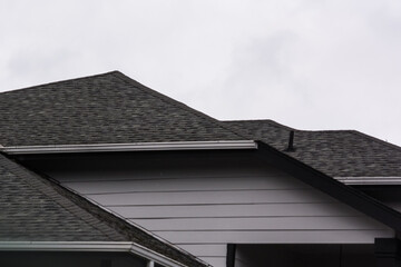 residential home asphalt composite shingle roofing close-up