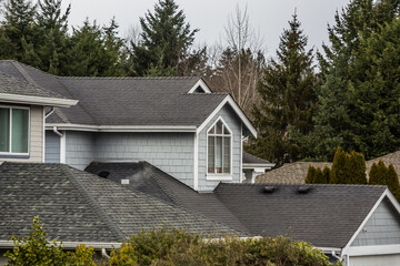 Fototapeta na wymiar residential home asphalt composite shingle roofing wide angle