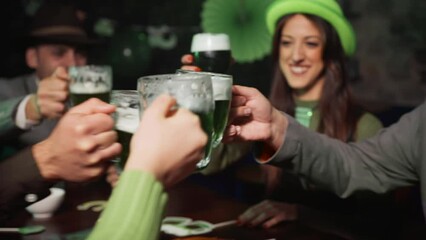 People drinking green beer into a pub