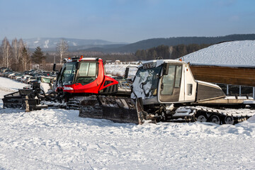 Several snowcats at ski resort in winter