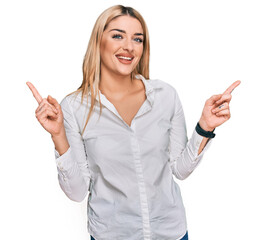 Young caucasian woman wearing casual clothes smiling confident pointing with fingers to different directions. copy space for advertisement