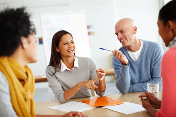 Theres no better work than teamwork. Shot of a group of casually dressed businesspeople in the office.