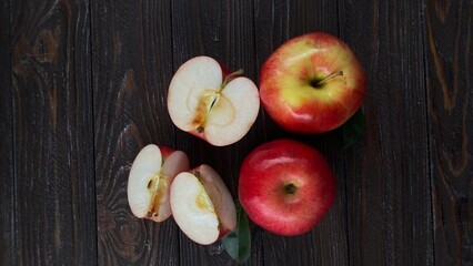 Ripe, juicy apples on wooden background