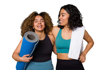 Two friends, of different ethnicities, are pumped and ready to hit the gym together.