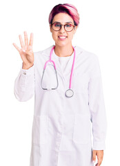Young beautiful woman with pink hair wearing doctor uniform showing and pointing up with fingers number four while smiling confident and happy.
