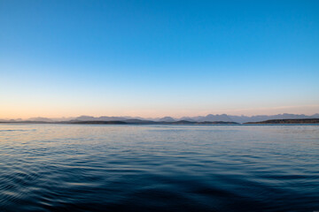 Fototapeta na wymiar Vancouver Island Mountain Coastline at Sunset During Summer