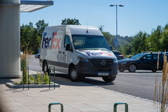 Gothenburg, Sweden - August 11 2022: FedEx delivery van outside an office.