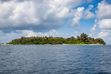 green tropical island in the sea