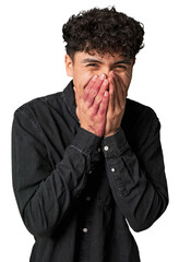 Young latin man rejecting someone showing a gesture of disgust.