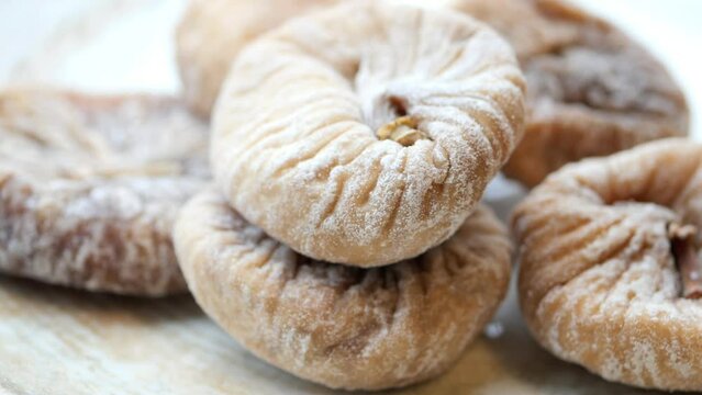 Dried fig fruit on on a plate on table 