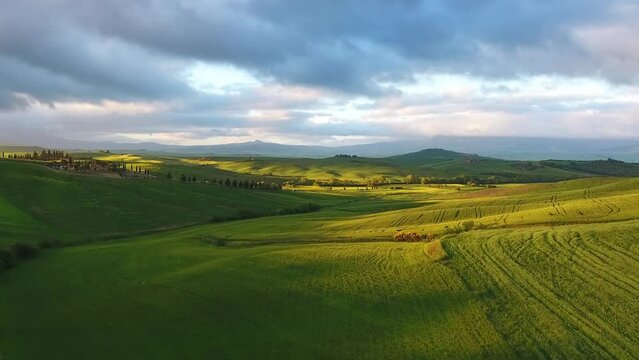 Tuscany aerial sunrise farmland hill country landscape. Italy, Europe