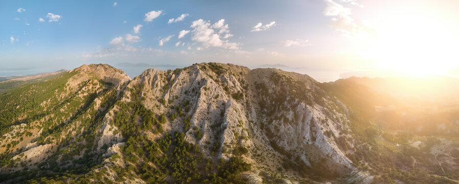 Mount Dikeos. Panoramatic, aerial view of two highest peaks of Island Kos: Dikeos and Christos against sunset. Kos island, Greece.