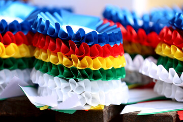 Pile of horse sport trophies rosettes at equestrian event
