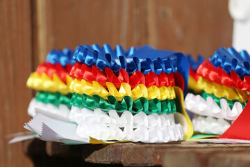 Pile of horse sport trophies rosettes at equestrian event