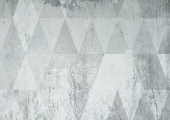 Grey geometrical old triangles wallpaper on concrete. Texture