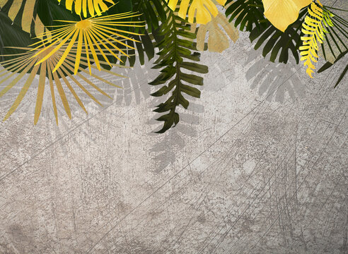 Tropical gold and green exotic nature leaves on old grey stone and concrete wallpaper