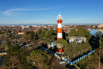 Lighthouse on the sea coast in Poti, Georgia, aerial drone view