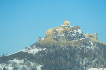 Fototapeta premium Rasnov fortress photographed in the cold season.