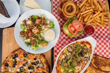 Food. Set of dishes on the table. On a black background. Top view.
