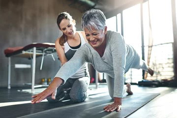  Get fit and have fun while doing it. Shot of a senior woman working out with her physiotherapist. © M Moller/peopleimages.com