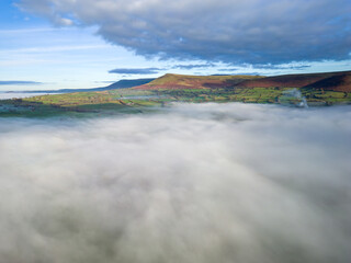 Aerial view of fog caused by a temperature inversion over a rural farming area