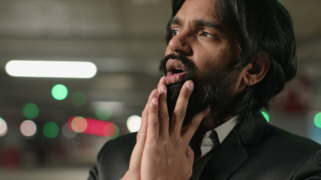 Frustrated stressed young indian man suffering due to life grief feel despair unhappy due personal troubles divorce debt financial problems worried arabian businessman feeling crisis praying with hope