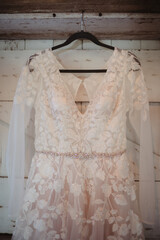 wedding dress on a hanger