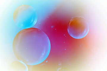 Abstract background in blue violet tones. Distortion in water with oil drops.