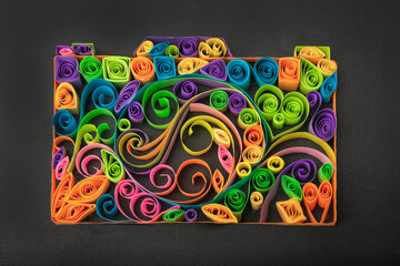 Paper quilling art camera design coils and swirls abstract concept