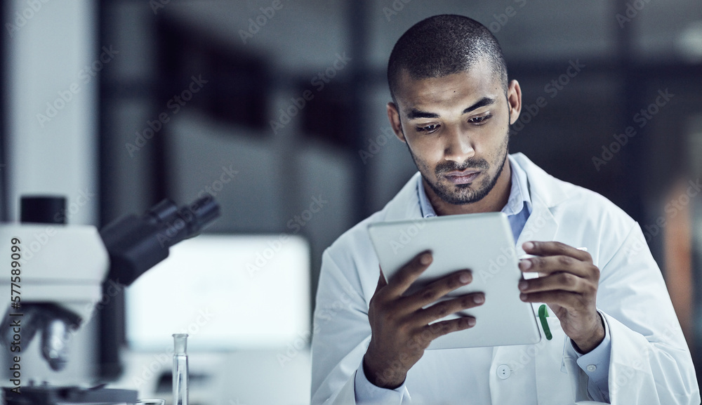 Poster the use of electrical medical records increases. shot of a scientist recording his findings on a dig