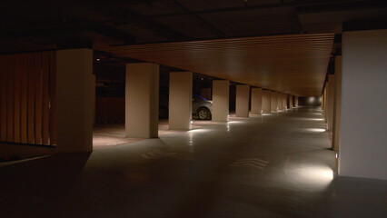 Modern complex of parking spaces in residential building. Stock footage. Modern design of expensive...