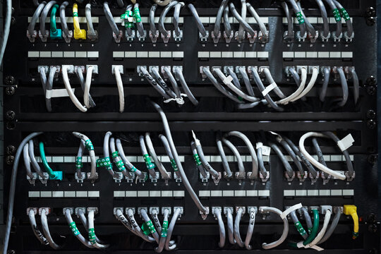 Complicated yet efficient. Cropped shot of the inside of a computer with all of its wiring located in a server room.